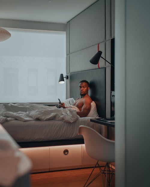 Man Lying in Bed