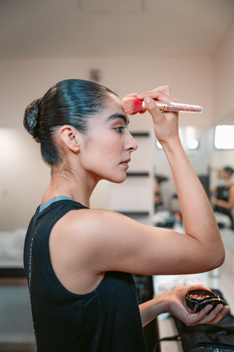 Woman Applying Makeup