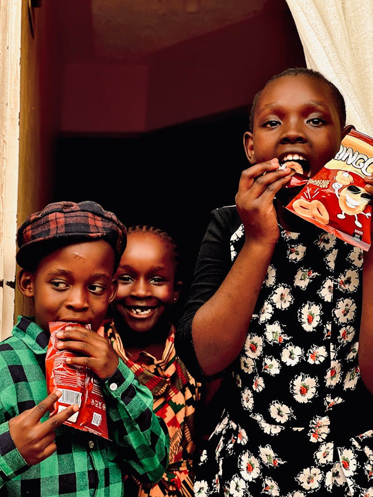 Boys And Girl Eating Chips