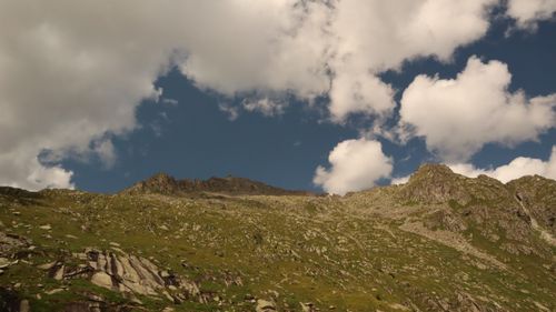 Free Beautiful mountain landscape with rocks and clouds in a clear blue sky. Stock Photo