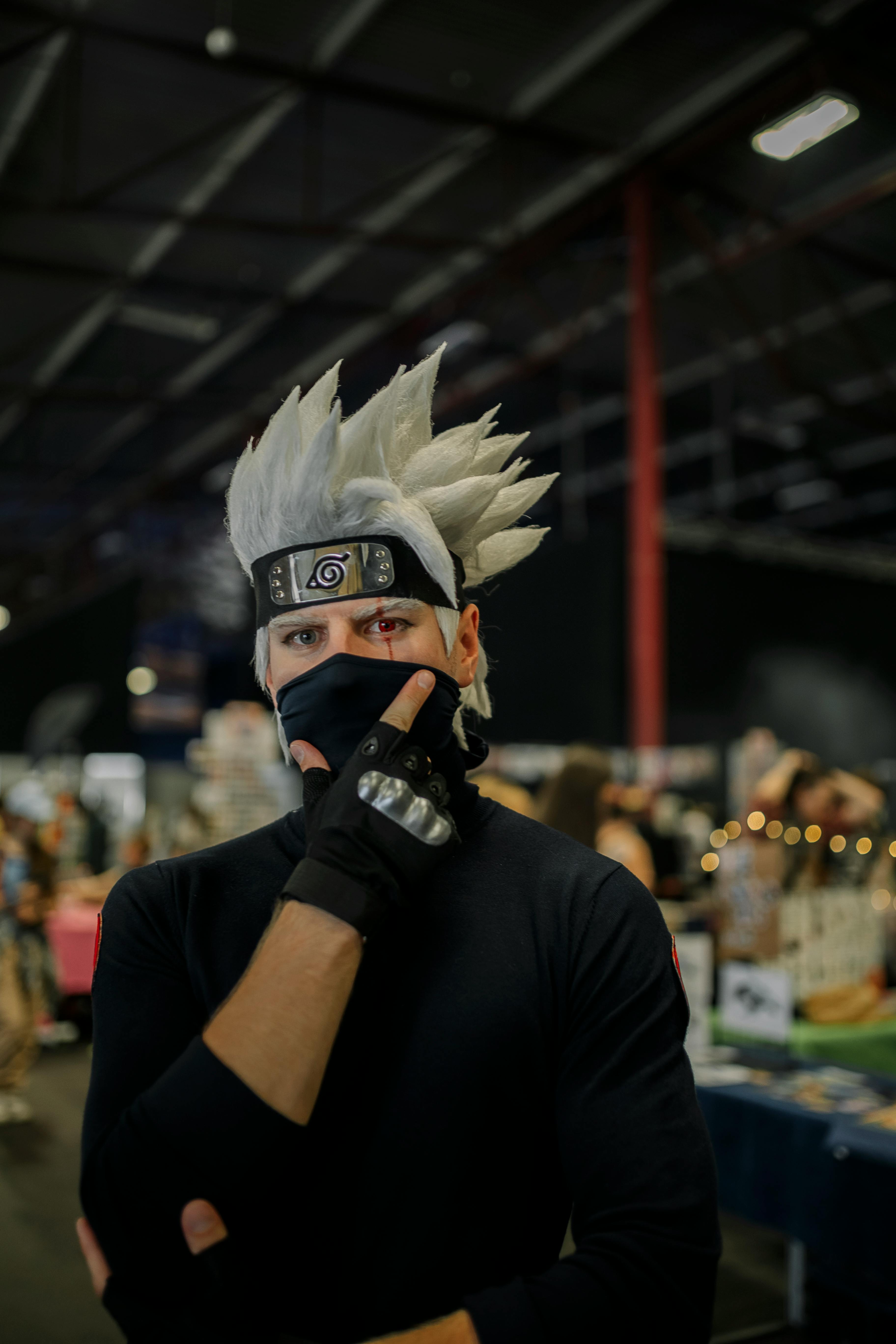 Young Man in a Cosplay at a Fan Convention Free Stock Photo