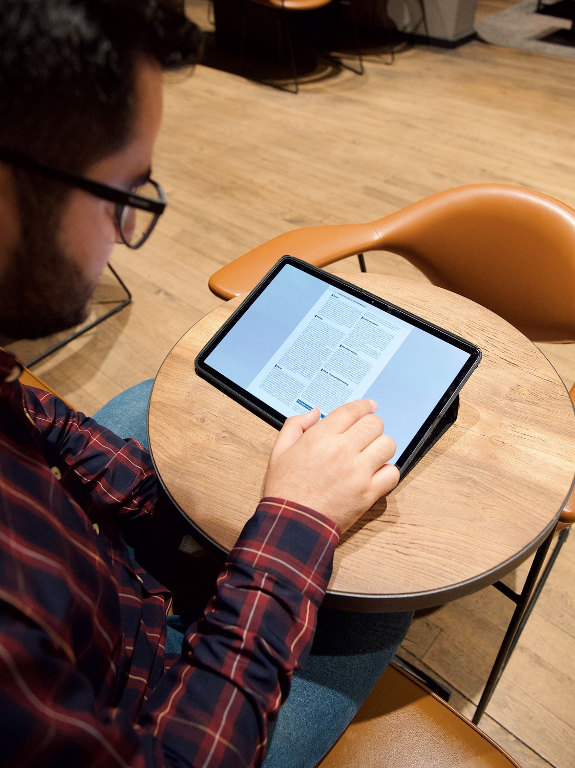 Man Using a Tablet · Free Stock Photo