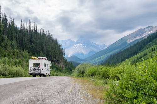 Camping Van on the Road in the Mountains