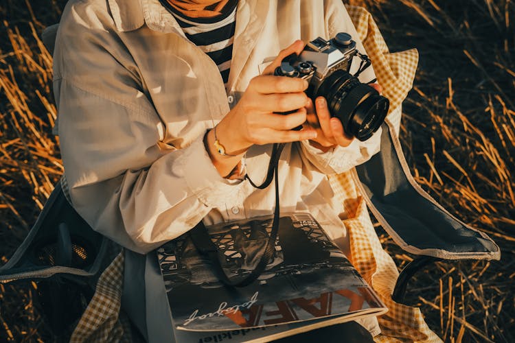 Woman Hands Holding Camera