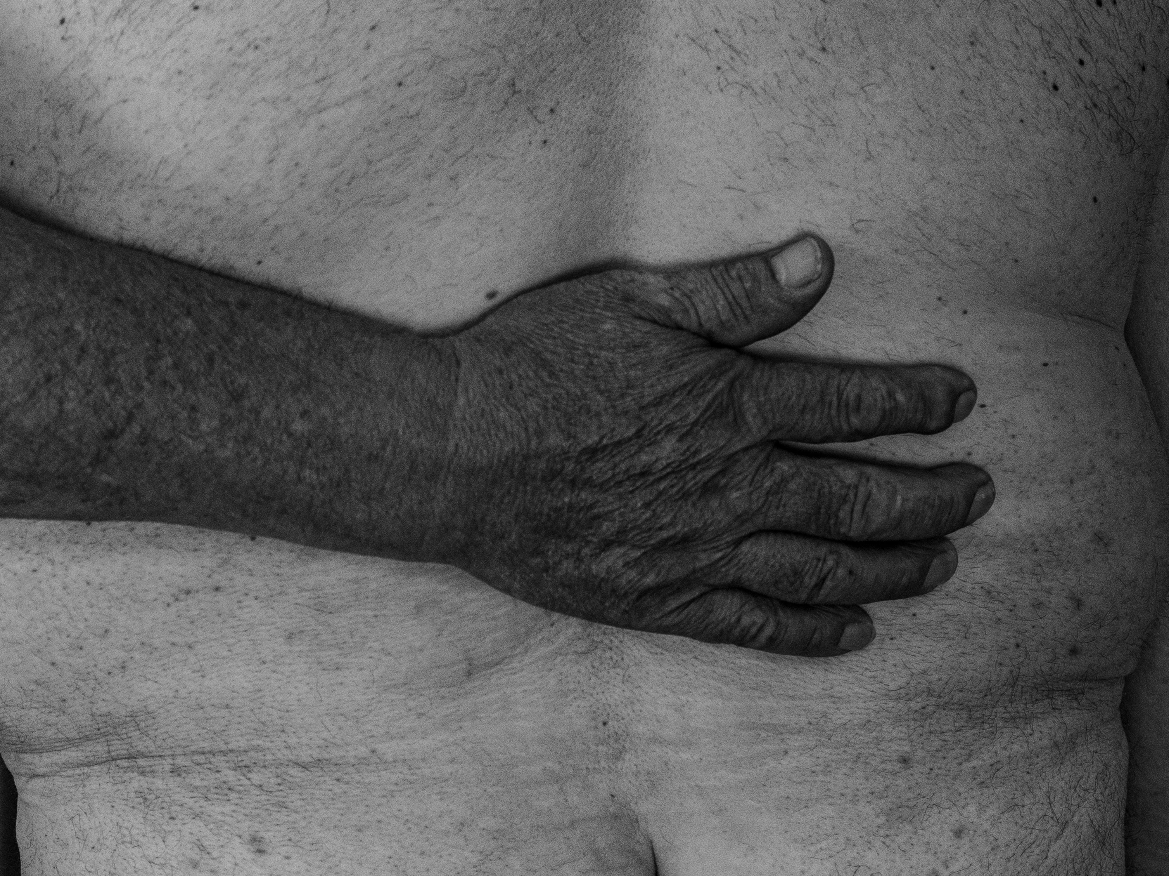 Hand on Back · Free Stock Photo