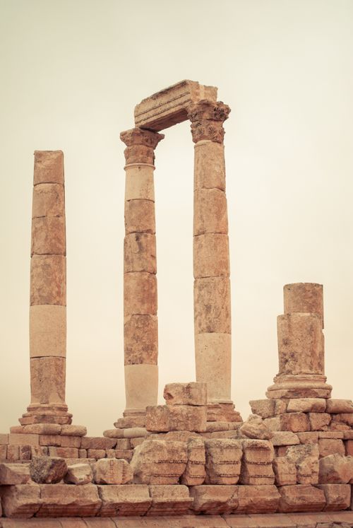 Free Ancient Temple of Hercules ruins at Citadel Hill, Amman, Jordan showcasing historical architecture. Stock Photo