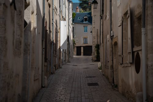 A Narrow Alley between Traditional Buildings in a Town 