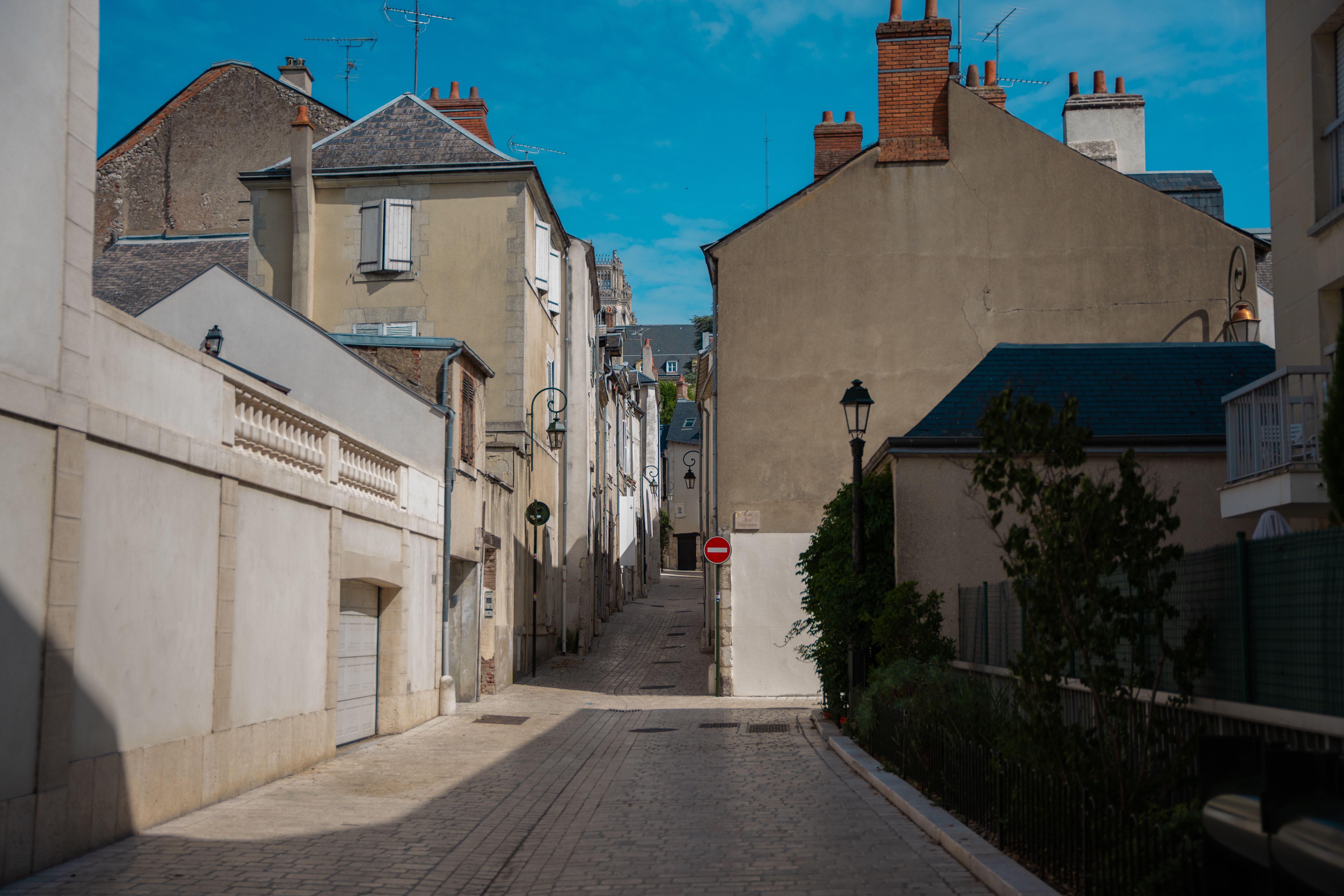 A Narrow Alley between Buildings in a Town · Free Stock Photo