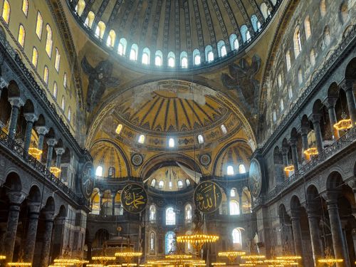 Free Capture of the stunning Hagia Sophia interior showcasing its iconic Byzantine architecture in Istanbul, Turkey. Stock Photo