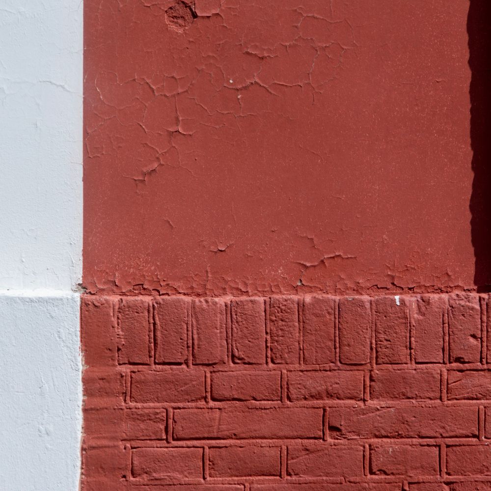Masonry and Render Painting in Marks Gate — clean edges cut in around trim and sockets