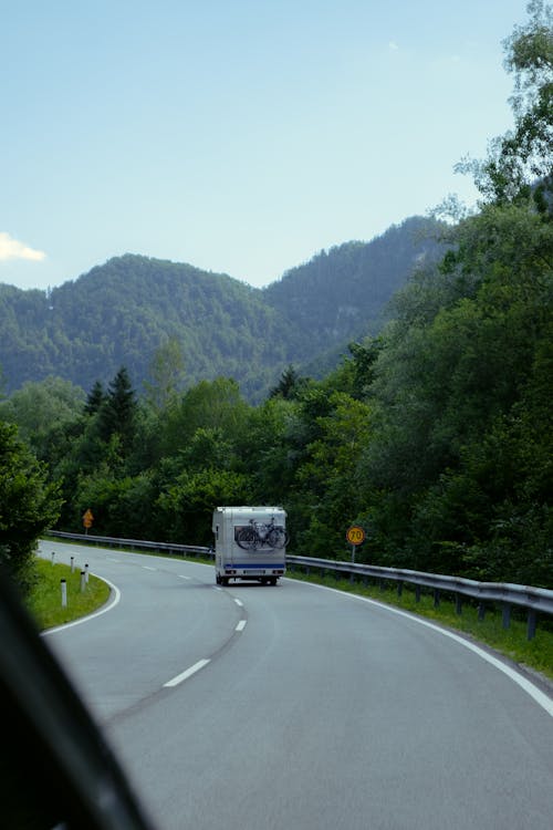 Camper on Road in Mountains