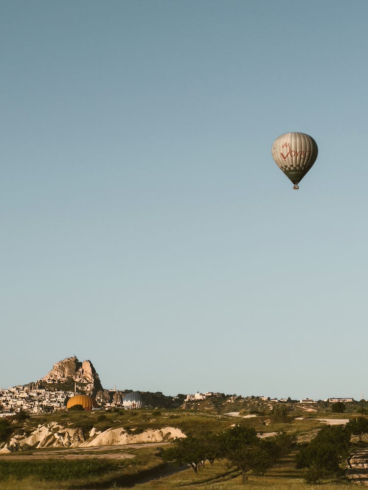 Balloon Flying Above Canyon