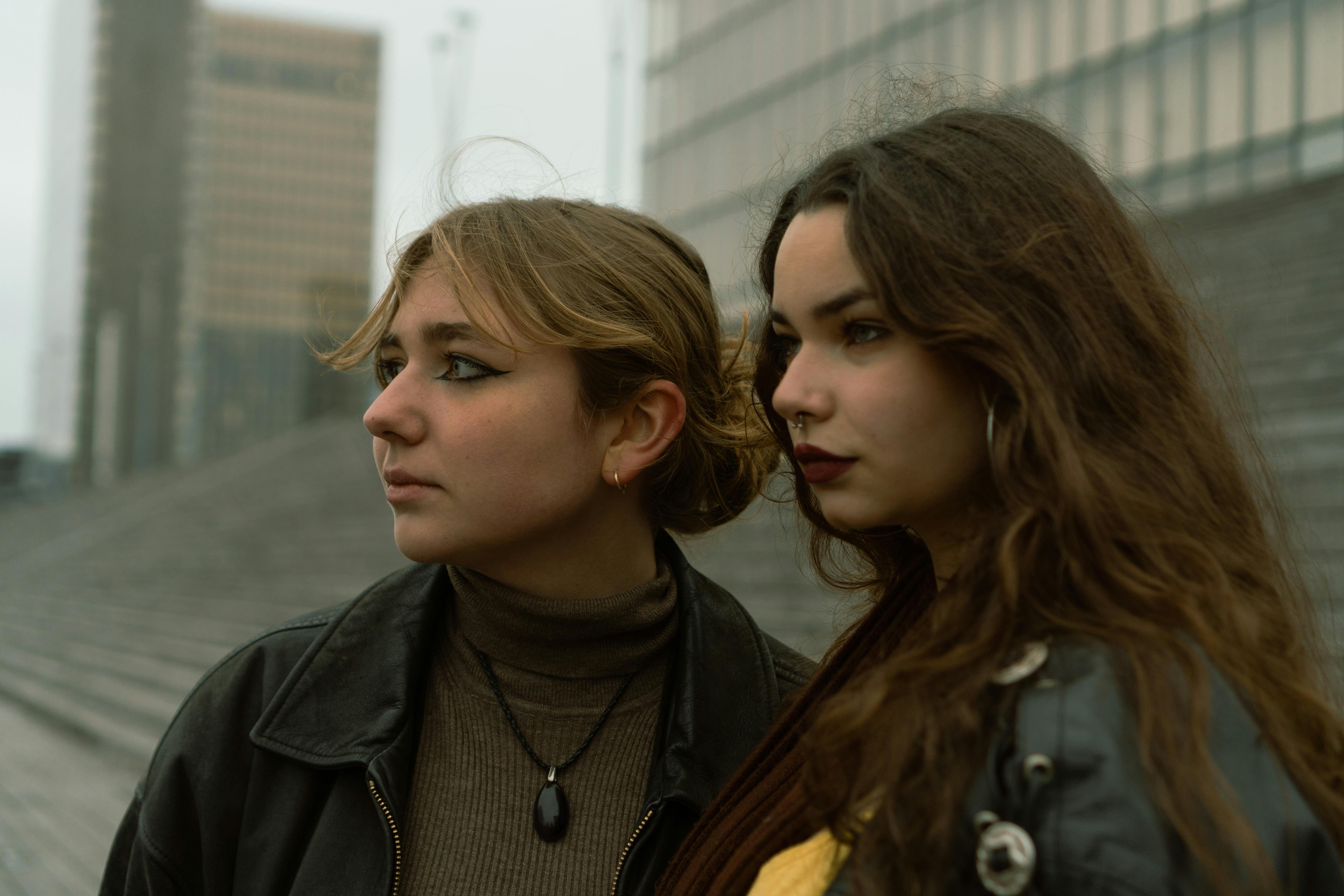 A close-up of Harry Styles wearing his iconic pearl necklace, symbolizing the modern redefinition of masculine jewelry.