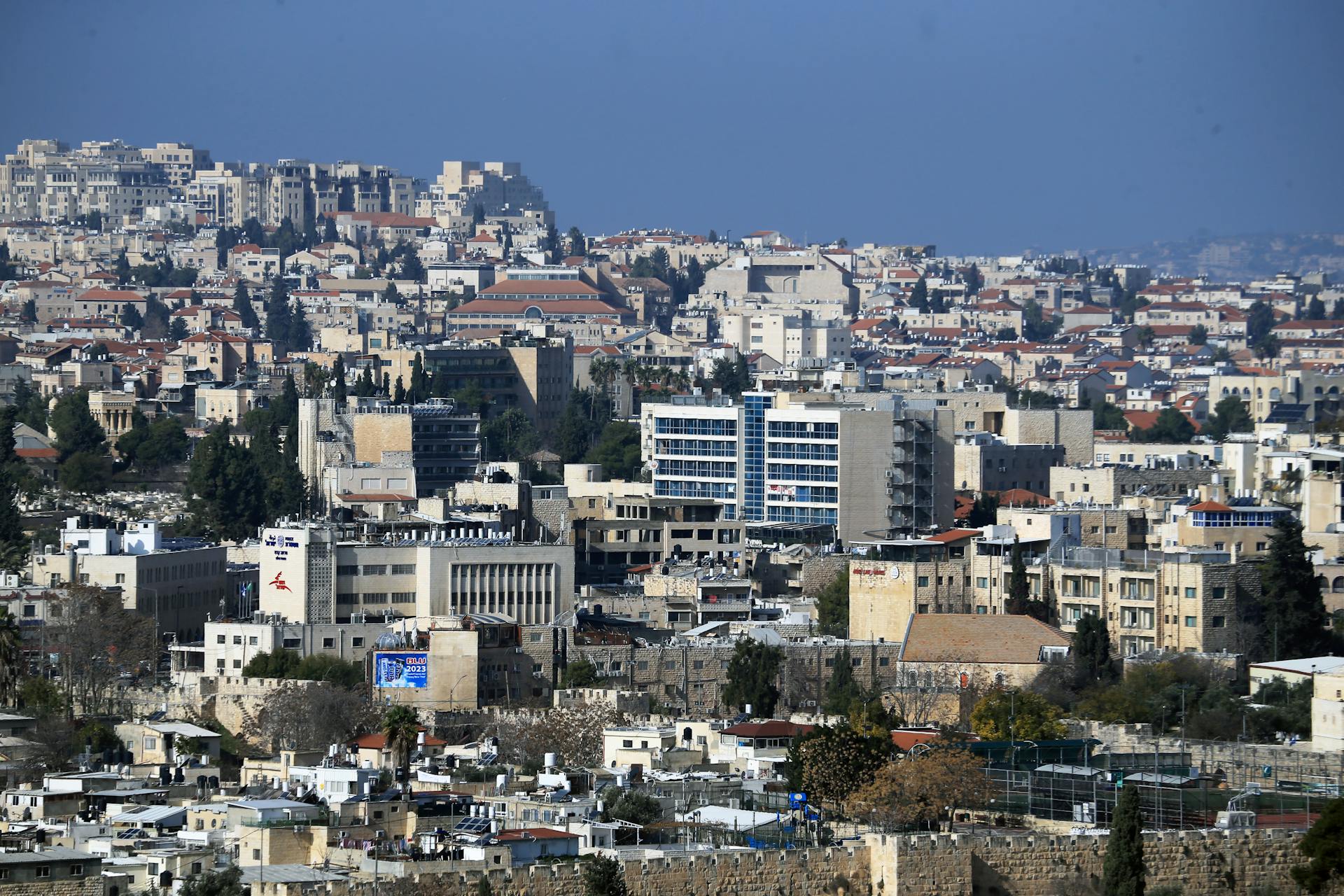 Explore the stunning skyline and urban architecture of Jerusalem from a high vantage point.