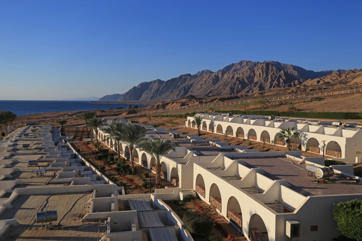 Aerial view of Dahab's coastline with the Sinai mountains in the background