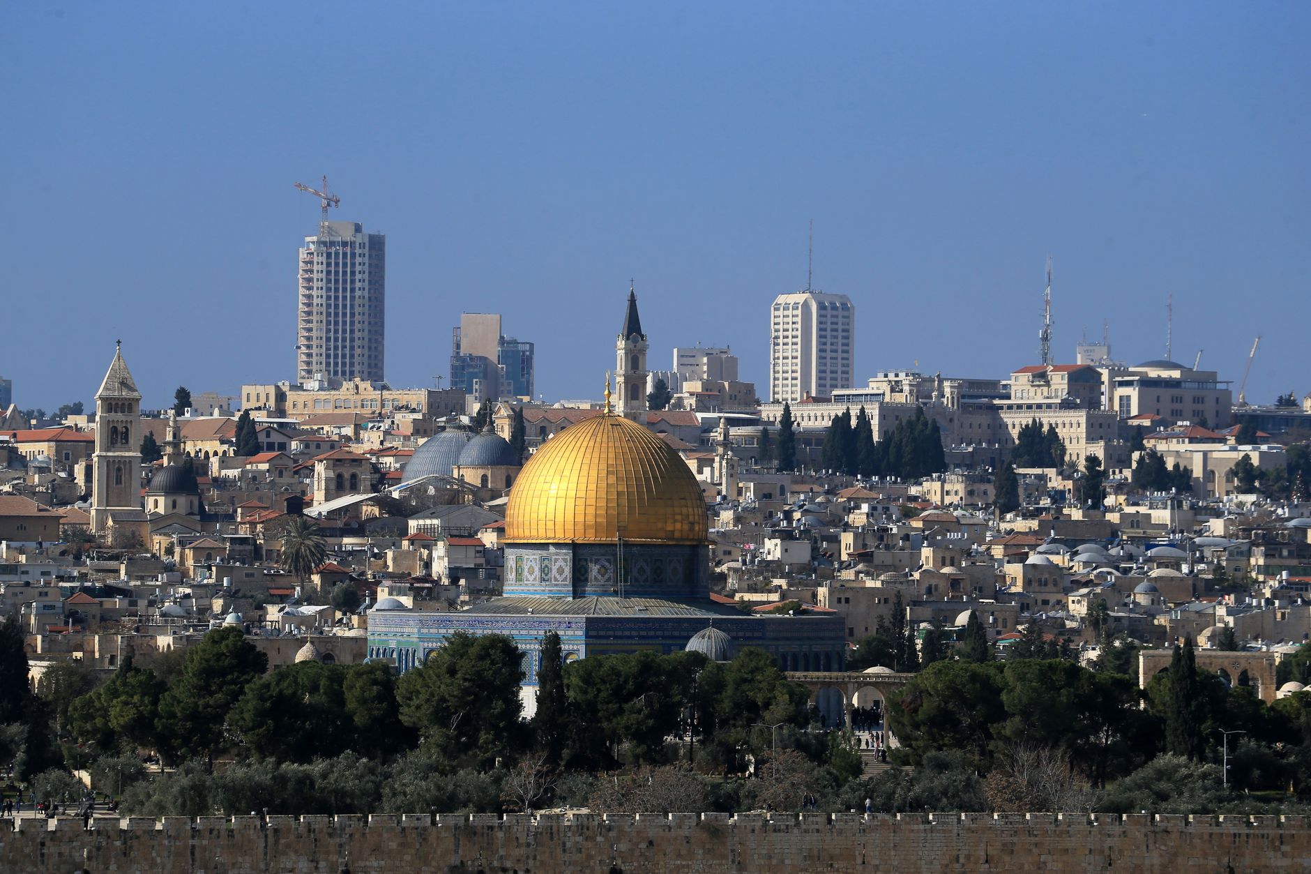 Skyline of Jerusalem featuring the iconic Dome of the Rock, a key religious landmark.