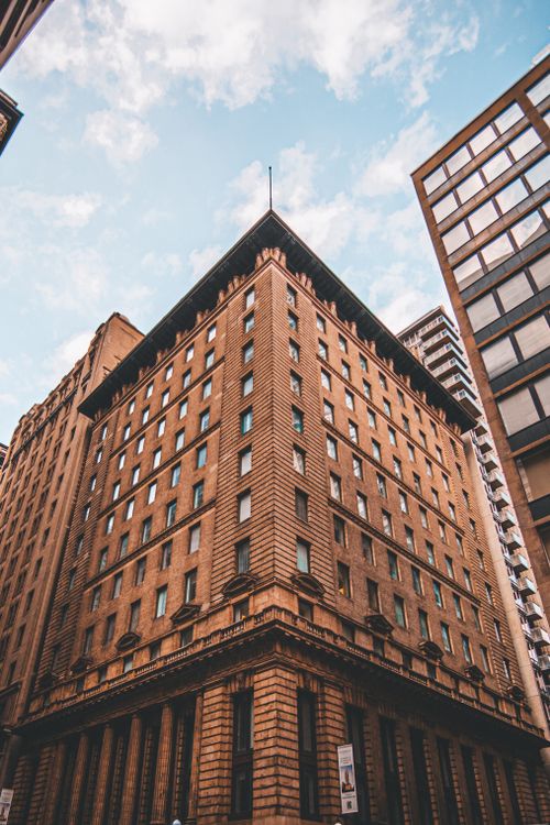 Free Low angle view of historic traders bank building in downtown Toronto, showcasing urban architectural beauty. Stock Photo