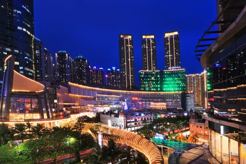 Free Illuminated Jakarta cityscape showcasing modern skyscrapers and urban life at night. Stock Photo