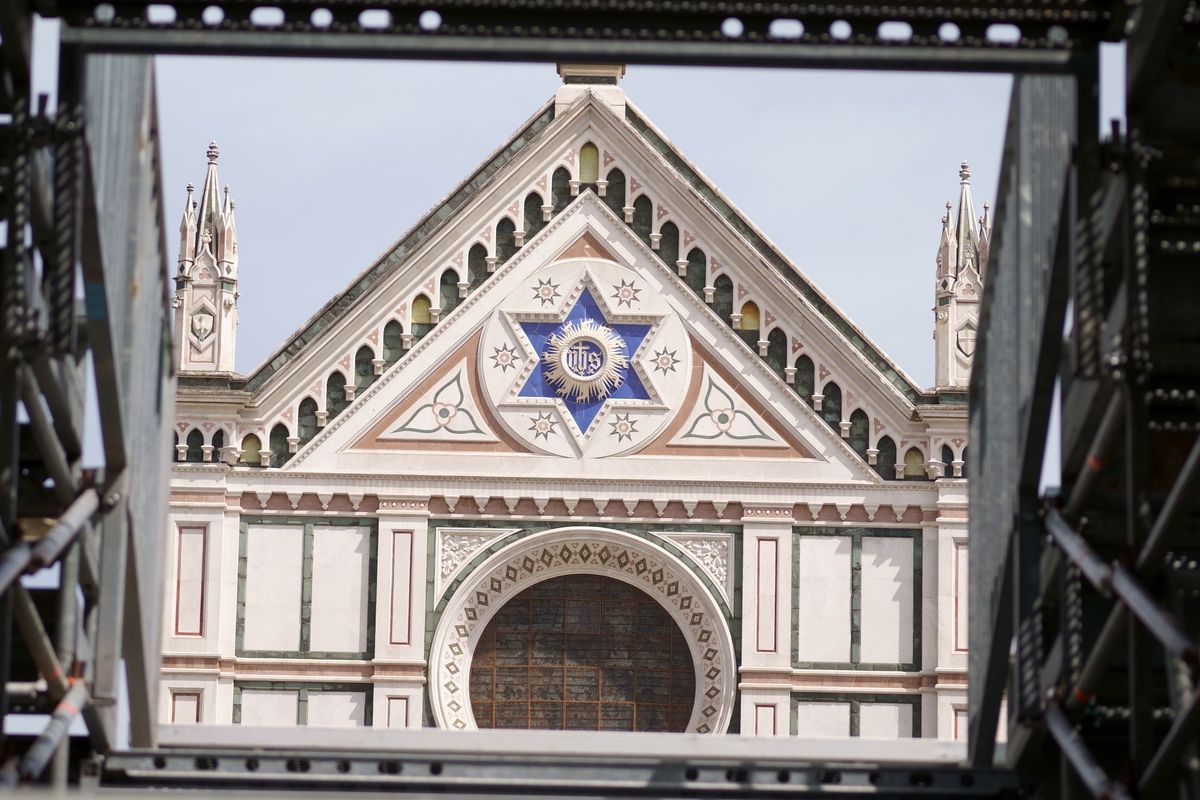 Basilica Santa Croce Florence neo Gothic marble facade with green and white Tuscan stone Star of David rose window