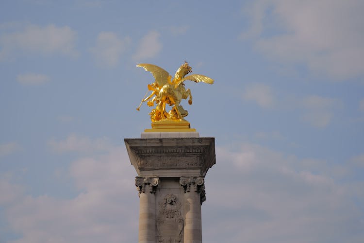 Statue On Alexandre III Bridge In Paris