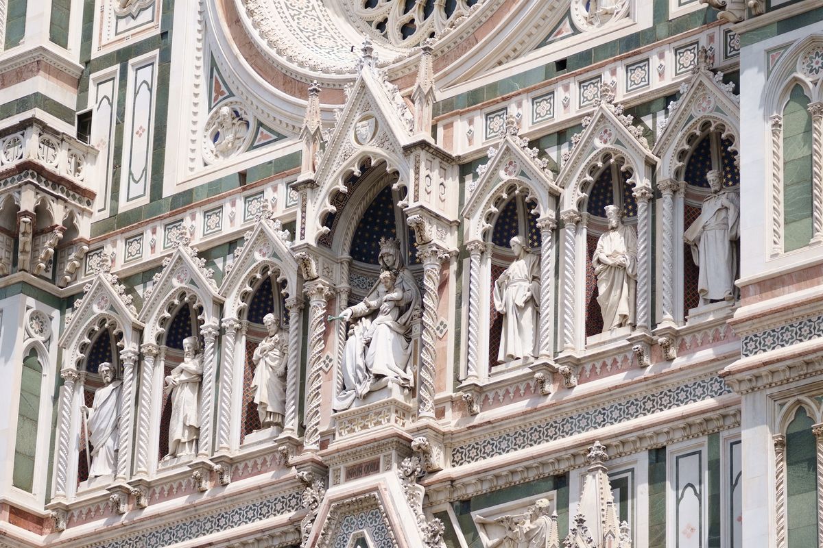 Detail of the polychrome marble facade of Florence Cathedral with green Prato marble pink Maremma stone and white Carrara