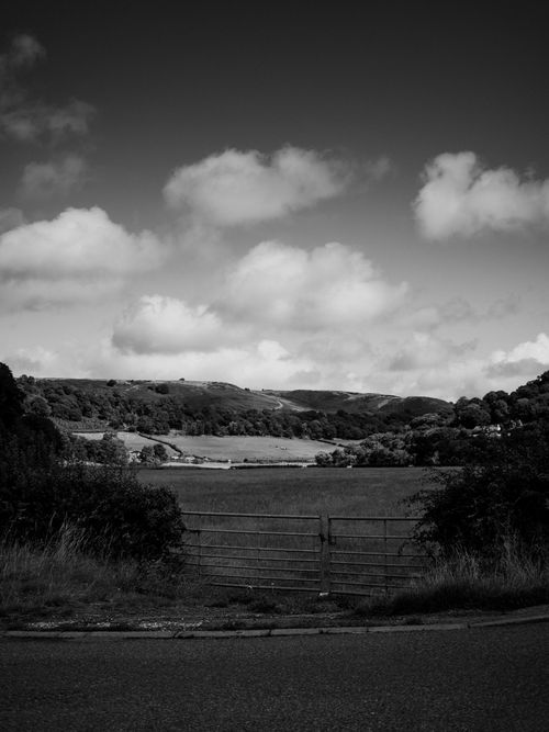 Free Picturesque black and white view of Llanfair Talhaiarn's rural landscape in Wales. Stock Photo