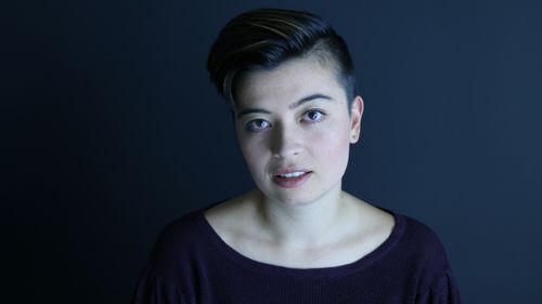 Free Chic portrait of a woman with short hair, exuding elegance. Captured in London. Stock Photo