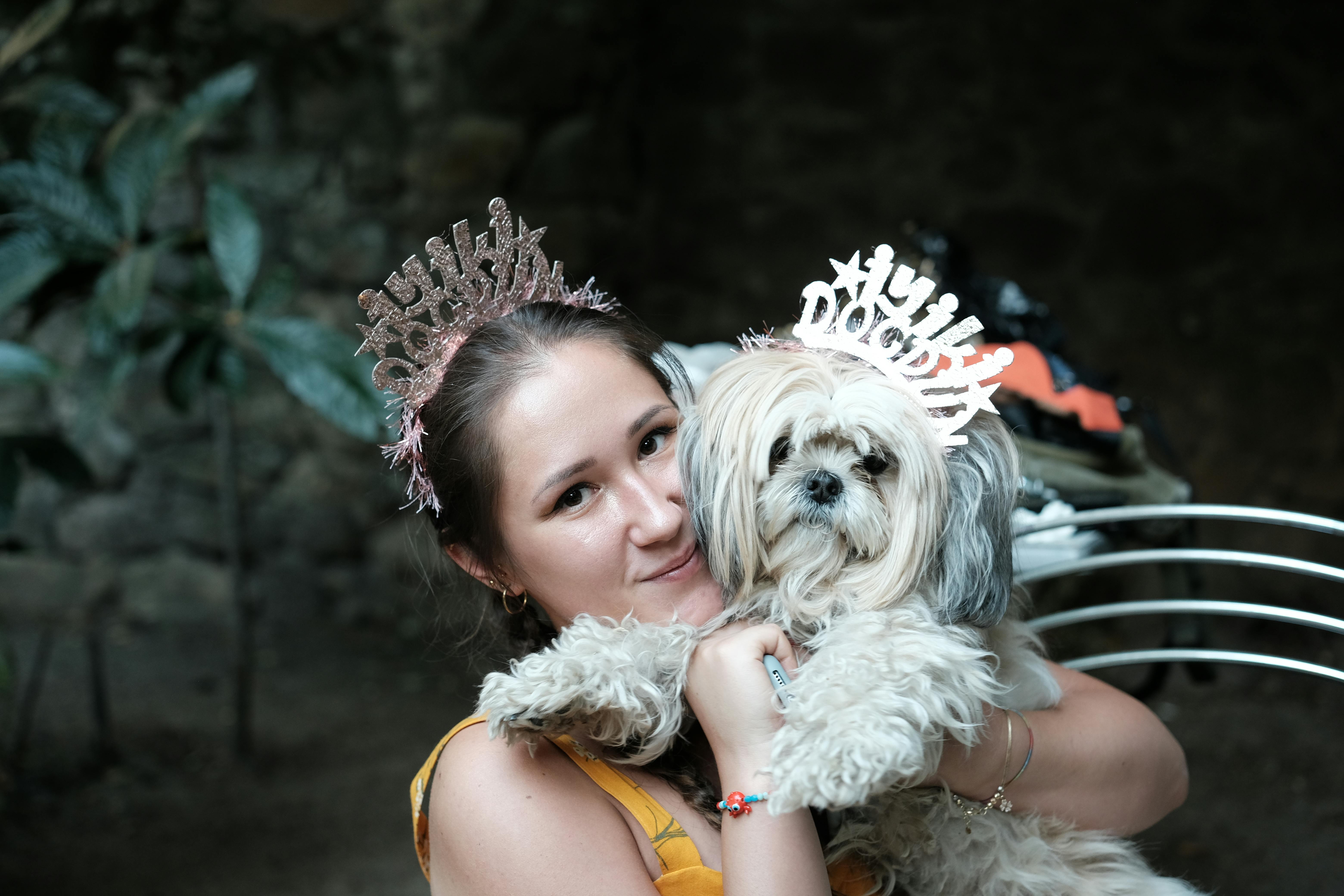 girl hugging a cute dog