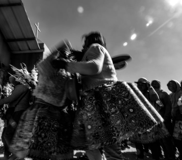 A Group Of People In A Village