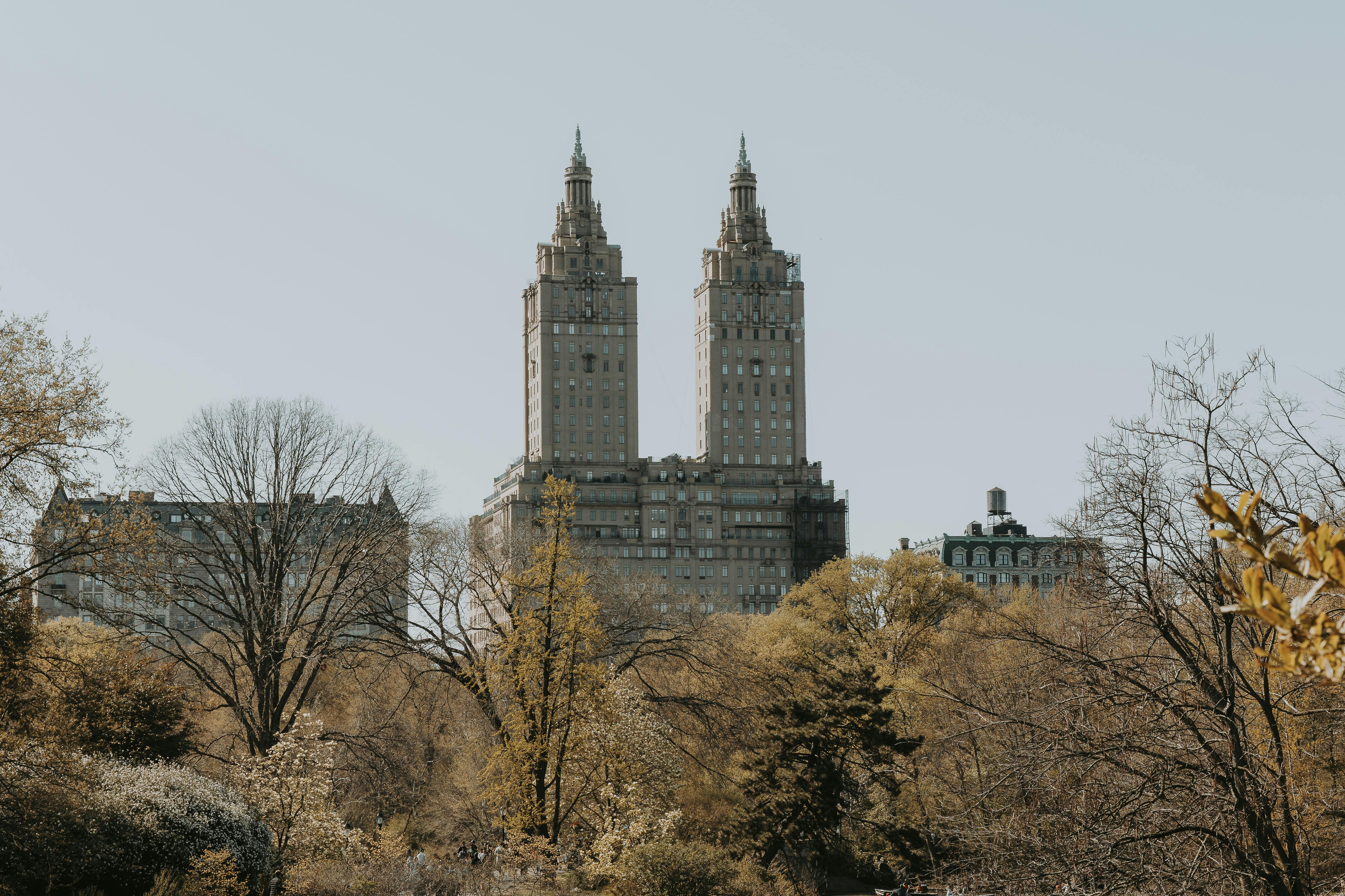 San Remo Building framed by autumn trees in Central Park, New York City.