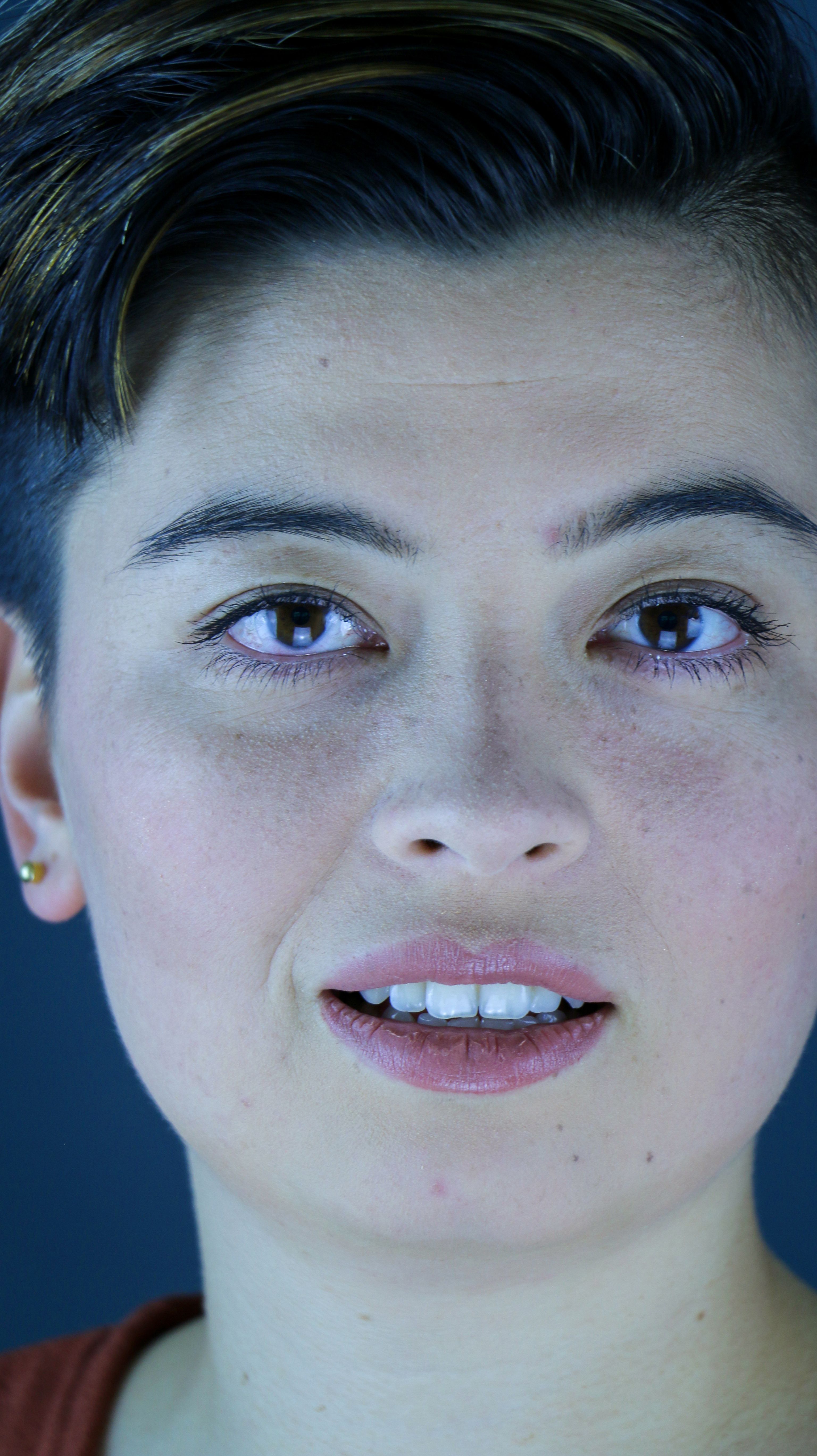 photo-of-a-smiling-girl-with-dyed-short-hair-free-stock-photo