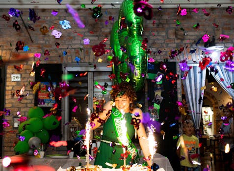 Festive birthday celebration with balloons, cake, and colorful confetti, highlighting a joyful atmosphere indoors.