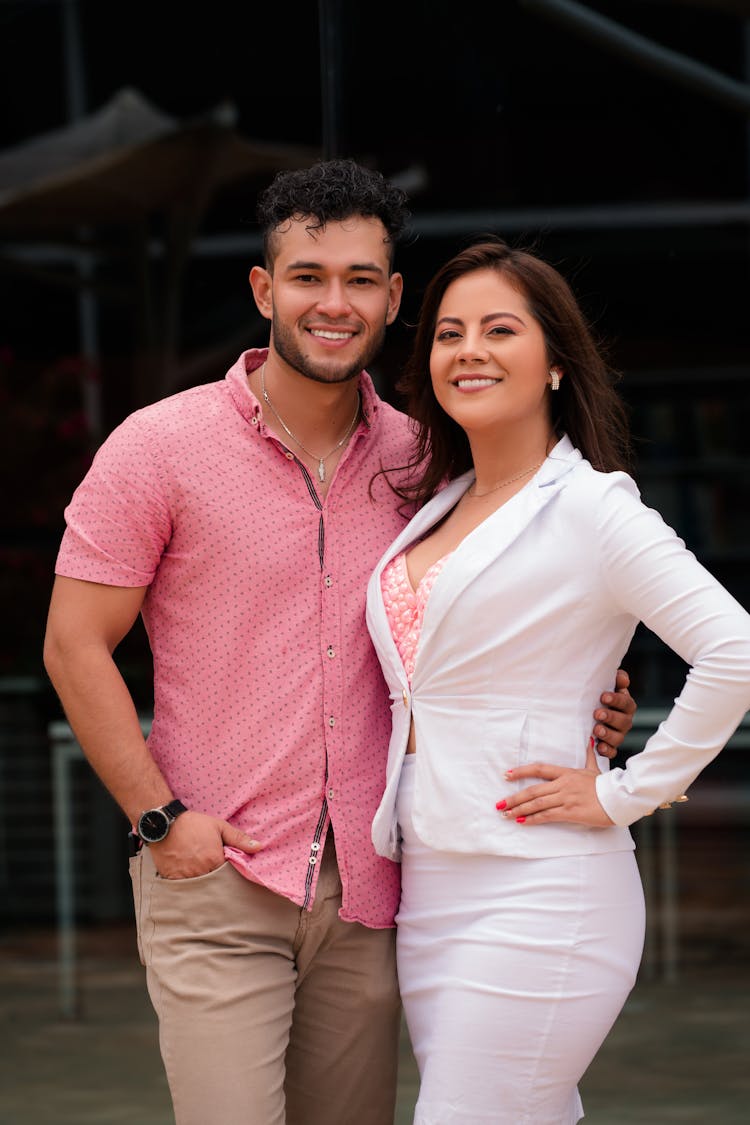 Young Couple Posing In A Yard