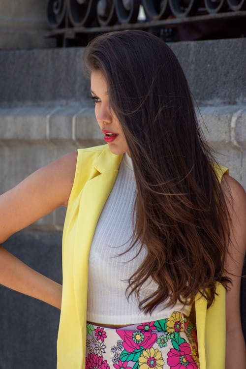 Model in Yellow Sleeveless Blazer