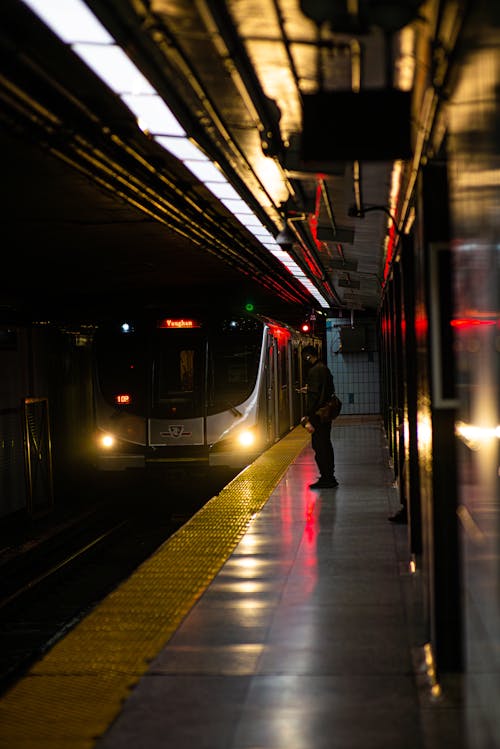 Man Waiting on a Metro Station