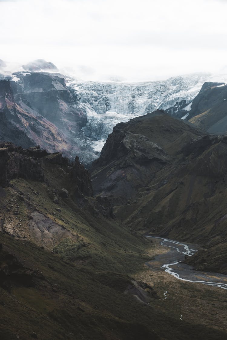 Glacier And Eroded Mountain Valley