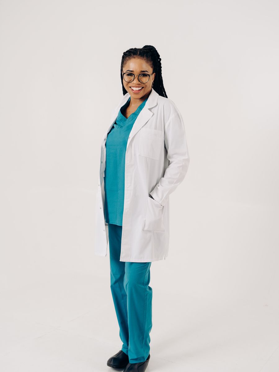 Female medical professional wearing wine scrubs