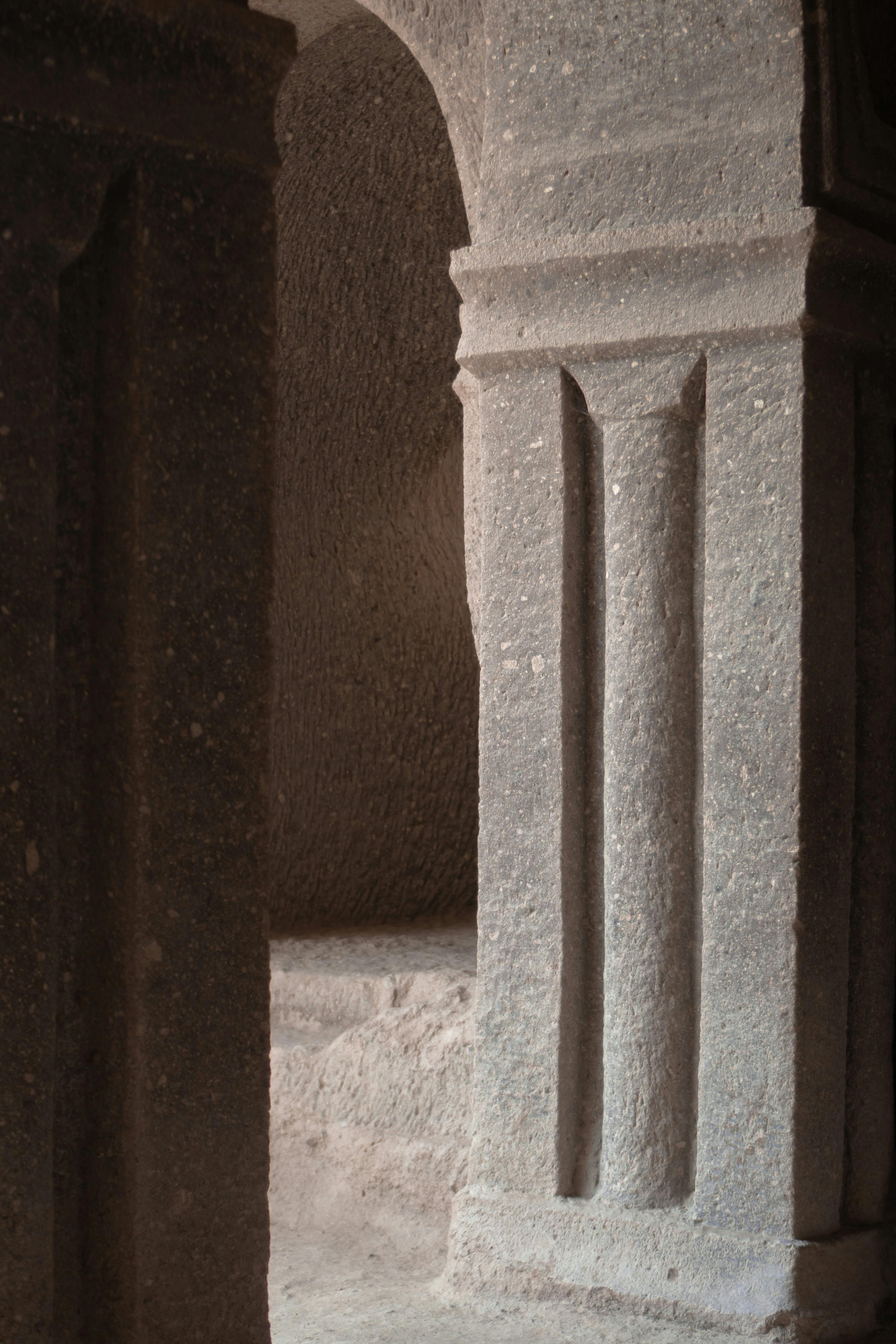 Closeup of ancient stone arches showcasing medieval architectural detail in Türkiye.