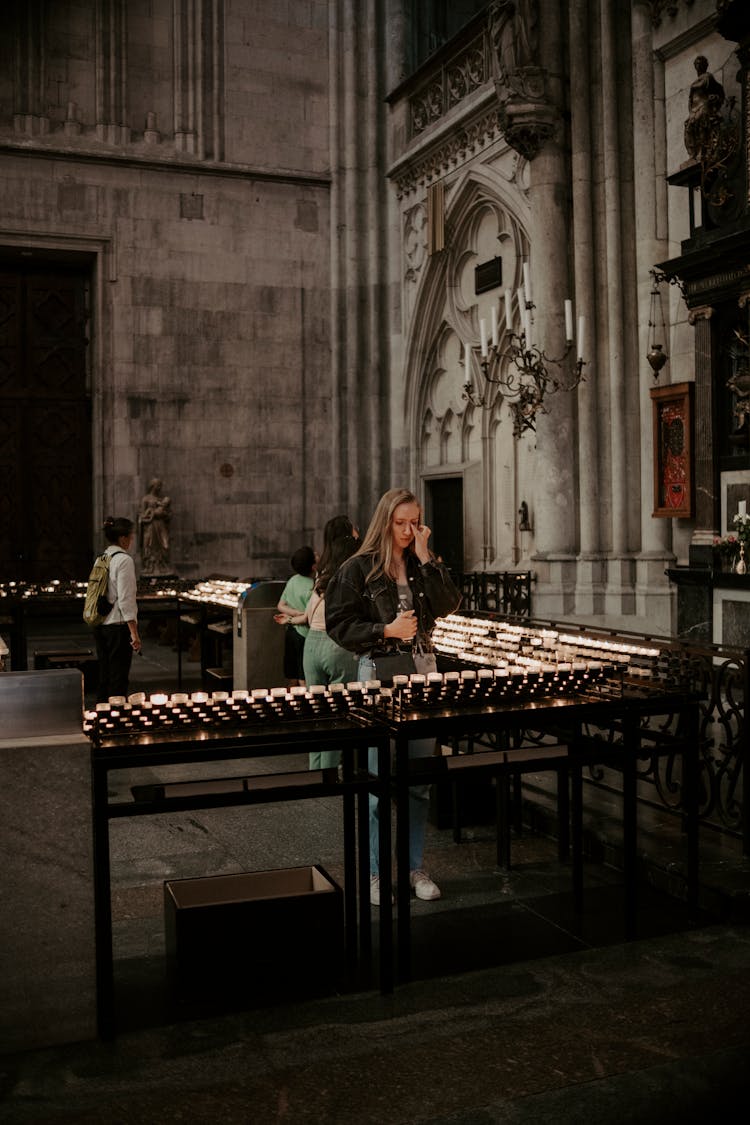 Woman On An Exhibition In Museum