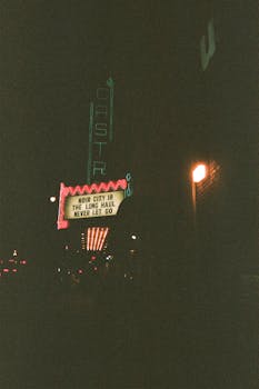 Night view of illuminated Castro Theatre sign in San Francisco during Noir City Film Festival.