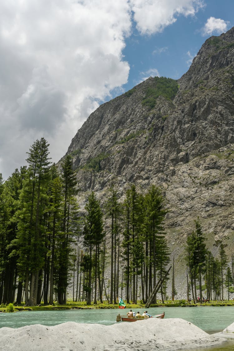 People Swimming In River In A Mountain Valley