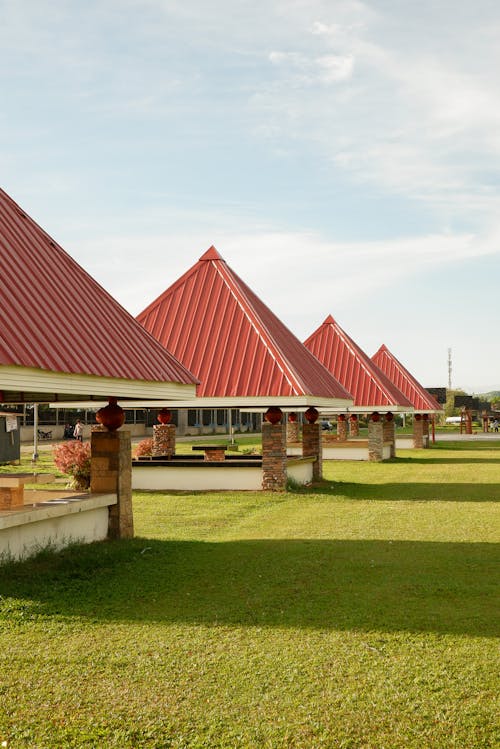 View of Gazebos with Red Roofs in a Park 