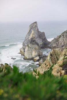 Stunning rock formation at Ursa Beach, Portugal, showcasing rugged coastal beauty.