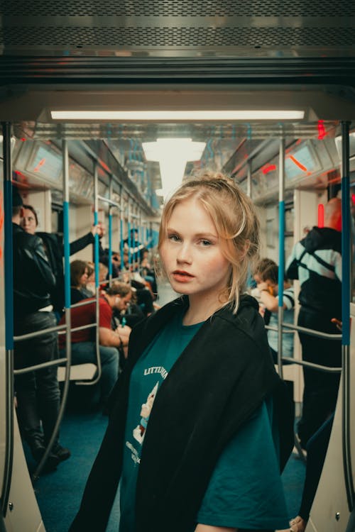 Blonde Girl in Public Transportation