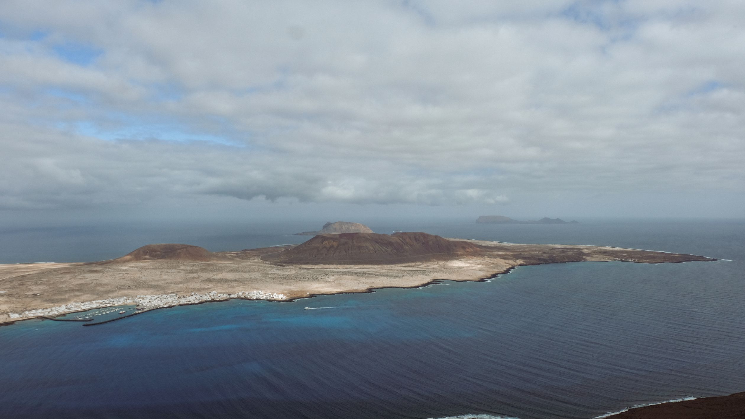 Photographer: alice-colombo Aerial view of La Graciosa from Mirador del Rio viewpoint on Lanzarote, Canary Islands