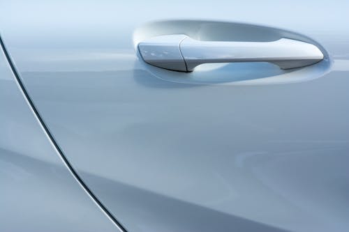 Closeup of a White Car Door Handle