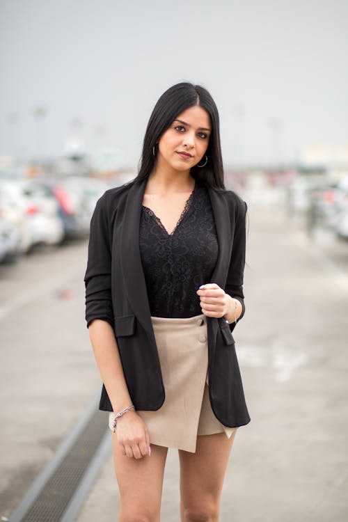 Young Elegant Woman Standing on the Parking Lot 