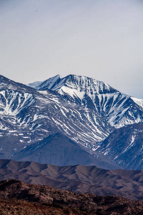 Free Breathtaking view of a snowy mountain peak against a clear sky, symbolizing winter's beauty. Stock Photo