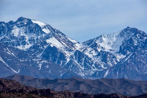 dağ doruğu, dağ silsilesi, dağlar içeren Ücretsiz stok fotoğraf