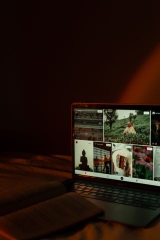 Laptop screen glowing in a dark room — photo by Beyzanur K. on Pexels